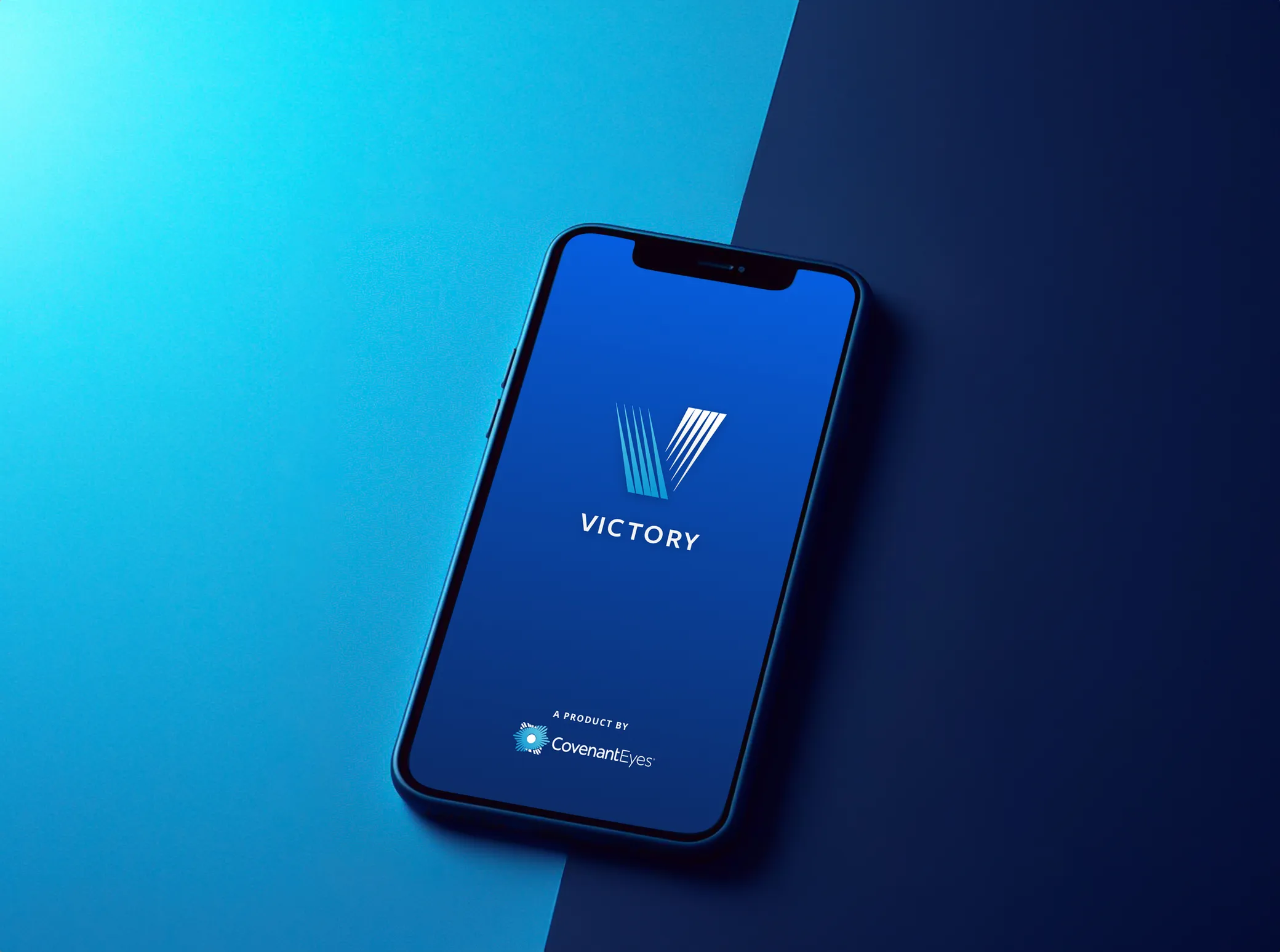 The Victory app’s launch screen on a phone, with the V logo and “A product by Covenant Eyes”